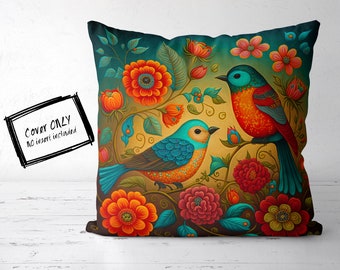 May include: A decorative pillow cover featuring a vibrant floral design with two colorful birds perched on a branch. The background is a rich teal color, and the flowers are in shades of red, orange, yellow, and pink. The birds are blue, green, and red with intricate details.