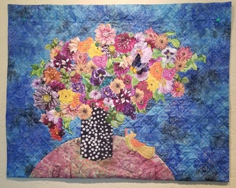 Floral Art Quilt/ wall hanging- Still life of large appliqued flower bouquet with hand-embroidered yellow bird on finely quilted blue batik