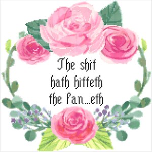 May include: A pink floral wreath with green leaves and the text "The shit hath hitteth the fan...eth"