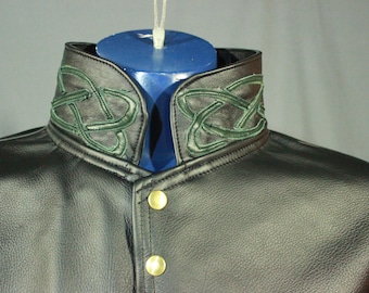 Leather dress coat with celtic highlights in forrest green.