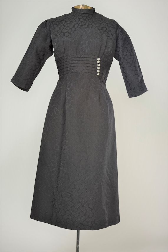 Vintage black cocktail dress with rhinestone accen