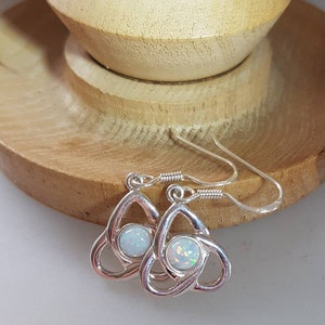 Celtic knot style drop earrings in 925 silver with Gilson  opal stones, with 5mm round stones