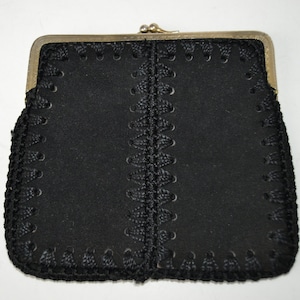 Monedero de cuero negro hecho a mano .vendimia estuche