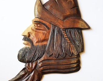 carved wooden man cabesa
