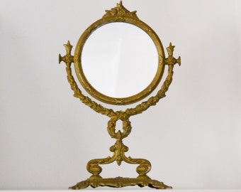 Victorian style metal mirror, Antique large round metal table mirror. Revolving mirror in die-cast metal frame pedestal