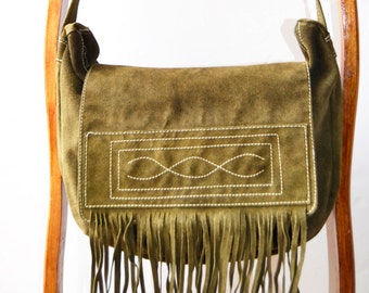 vintage green leather bag with hoses