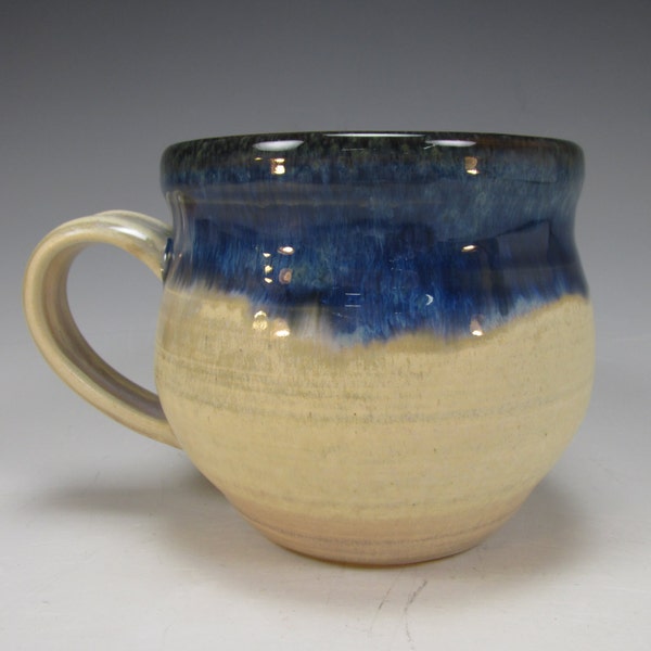 Handmade, stoneware, coffee mug. Blue and creamy white, ceramic tea cup