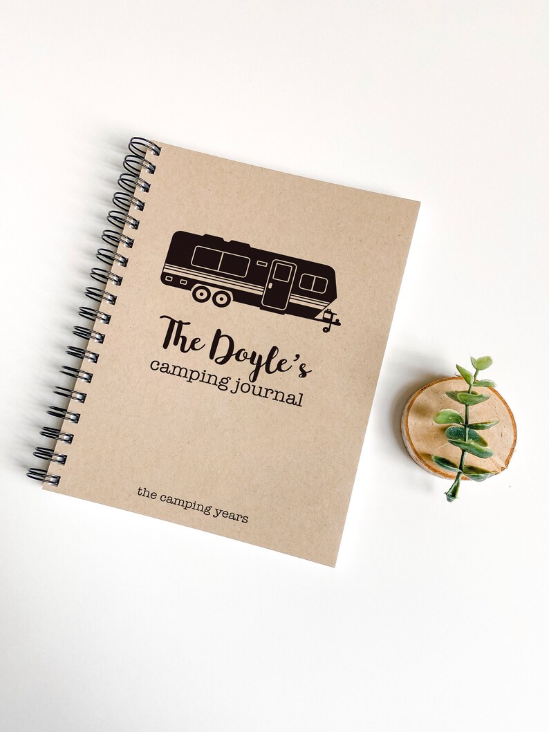 the perfect gift for your husband is a camping journal with a kraft paper cover print mobile-home car image