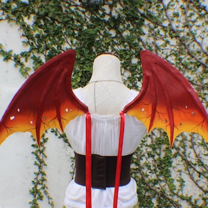 Custom deep red orange and yellow hand painted layered foam dragon inspired wings