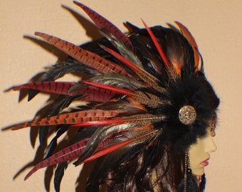 Custom black, red, orange and gold feather headdress with art nouveau medallions