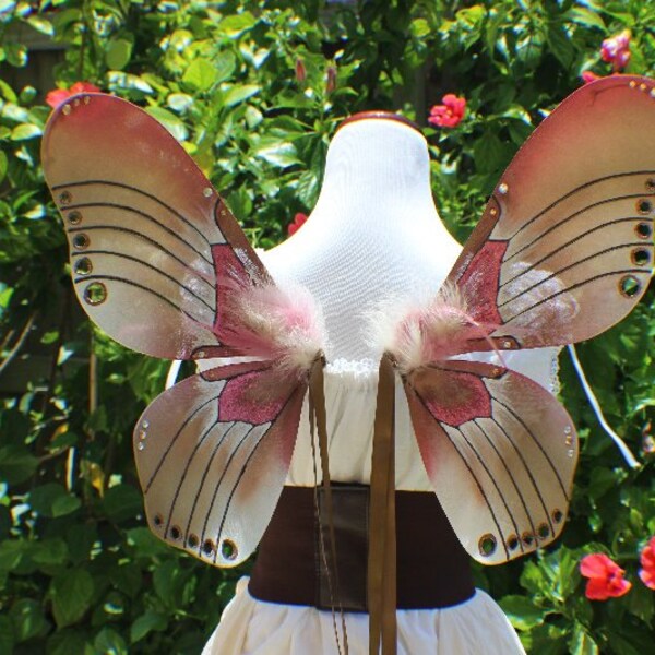 Earth tone, cream, tan, brown, bronze and dusty rose Moth ? Butterfly wings with feathers and bronze and pink glitter