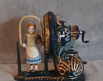 Cast Iron Mechanical Bank - Girl Skipping Rope