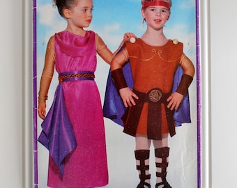 hercules goddess ancient greek or roman soldier costume sewing pattern butterick 2109 size 2 3 4 5 6 6x tunic cape leg bands dress