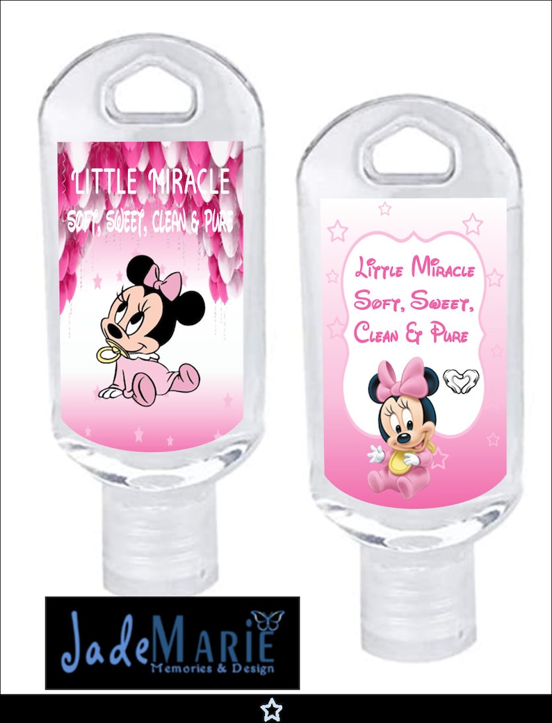 May include: Two clear plastic bottles with a pink and white label featuring a cartoon image of Minnie Mouse. The label reads "Little Miracle Soft, Sweet, Clean & Pure".