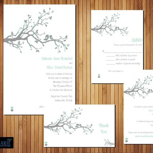 May include: Wedding invitation with a gray tree branch design and two birds in light blue. The invitation includes the names Sekenis Anne Henschel and Allen David Barton, the date Saturday, October 11, Two Thousand Fifteen, and the time 4 o'clock in the afternoon. The location is Kinya Isle Country Club, Jacksonville, Florida.