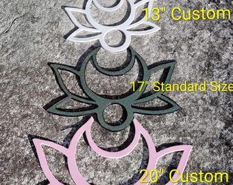 May include: Four laser-cut decorative pieces in the shape of a lotus flower with a crescent moon design. Sizes include 9" Mini's, 13" Custom, 17" Standard Size, and 20" Custom. Colors are purple, white, dark green, and pink.
