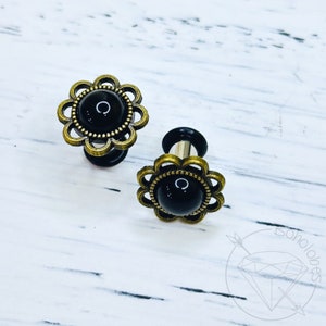 Black agate flower plugs gauges: 14g 12g 10g 8g 6g 4mm 4g 5mm 2g 6mm 1g 7mm 0g 8mm 11/32&quot; 9mm 00g 10mm 7/16&quot; 11mm