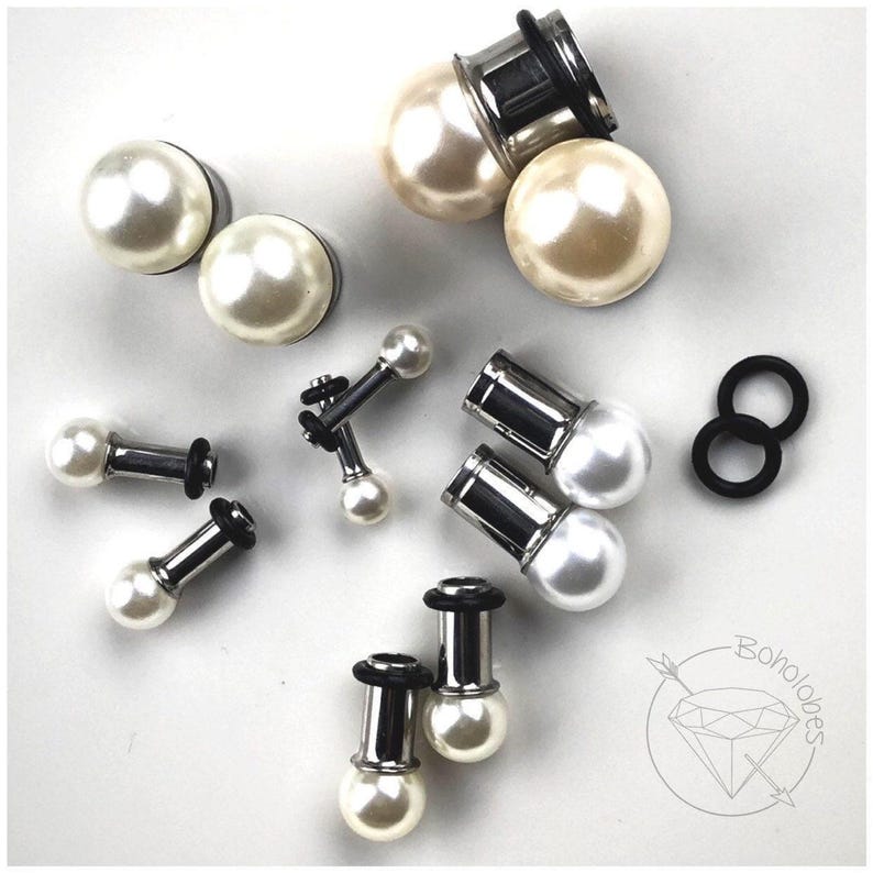 Pearl ball plugs 14g 12g 10g 8g 6g 4g 2g 1g 0g 11/32” 00g 7/16” 1/2” 9/16” 5/8” 11/13” 3/4” 13/16” 7/8” 1” image 1