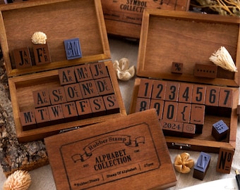 Juego de sellos de goma con el alfabeto vintage: caja de madera de haya