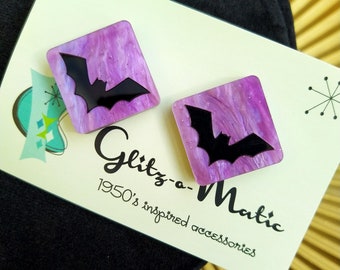 1950s style square bat earrings in purple & black by glitzomatic glitz-o-matic