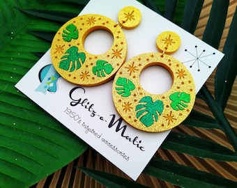 1950s style Monstera hoop earrings in gold and green glitter by glitzomatic glitz-o-matic
