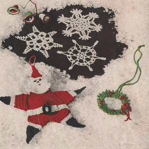 May include: A collection of crocheted Christmas ornaments, including a Santa Claus, a snowman, a wreath, and snowflakes. The ornaments are white, red, and green.