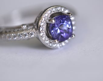 Brilliant Tanzanite in an Accented Sterling Silver Halo Ring