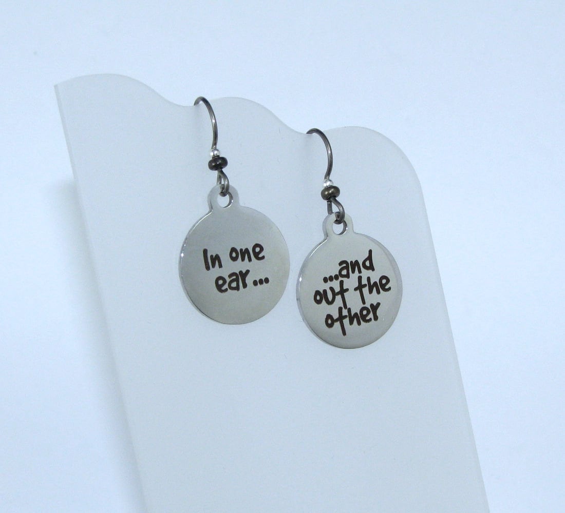 In one ear deals out the other earrings