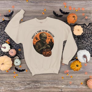 Halloween Zombie Sweatshirt - Spooky Vibes, Fall Fashion, Cozy Wear, Horror Unisex Crewneck Pumpkin Sweatshirt Perfect for Fall Parties