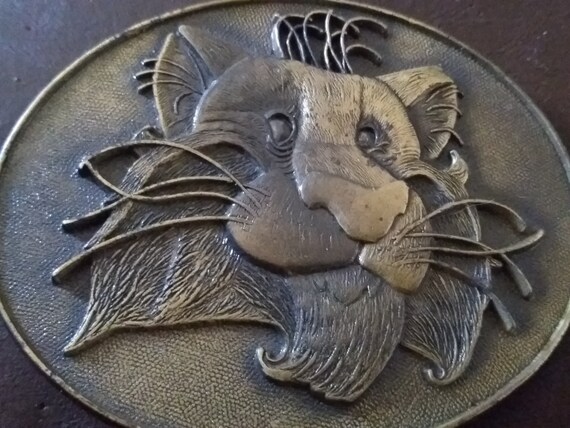 lion belt buckle