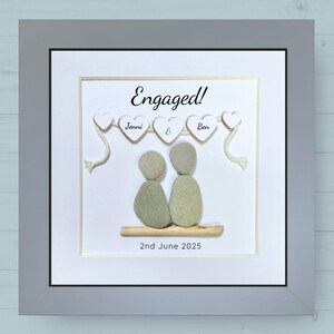 Personalised Pebble art picture in a white frame to celebrate an engagement
