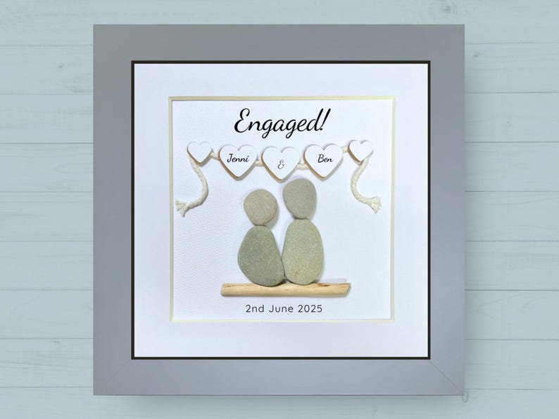 Personalised Pebble art picture in a white frame to celebrate an engagement