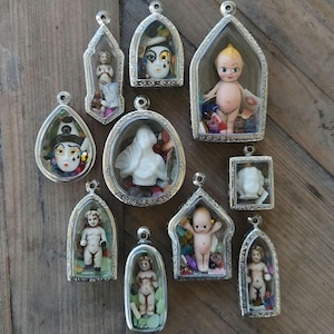 Antique Frozen Charlotte necklace, oddities jewelry, fidget shaker charm, goth locket, miniature victorian doll, witchy pendant, Kewpie doll