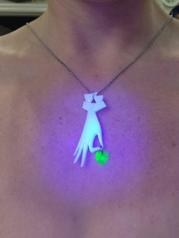 Vintage faux ivory resin hand and uranium glass heart necklace One of a kind found objects pendant Uranium glass jewelry Valentines Day gift