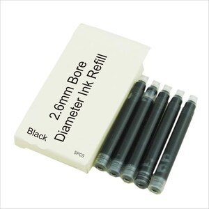 May include: Five black ink cartridges for fountain pens. The cartridges are labeled "2.6mm Bore Diameter Ink Refill" and "Black". The cartridges are packaged in a white box with the text "5PCS".