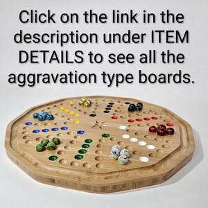 May include: An octagonal wooden board game with circular indentations and colored glass marbles. The text reads: Click on the link in the description under ITEM DETAILS to see all the aggravation type boards.