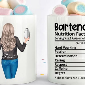 May include: White ceramic mug with a cartoon illustration of a bartender holding a cocktail and a shaker. The mug has the name "Diana" on the back and "Bartender Nutrition Facts" on the other side. The mug is filled with marshmallows.