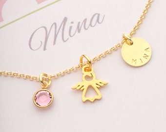 May include: Gold necklace with three charms: a pink crystal, an angel cutout, and a round charm with the name "Mina" engraved on it.