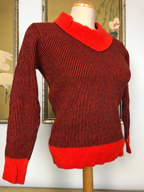 Black and orange striped sweater best sale