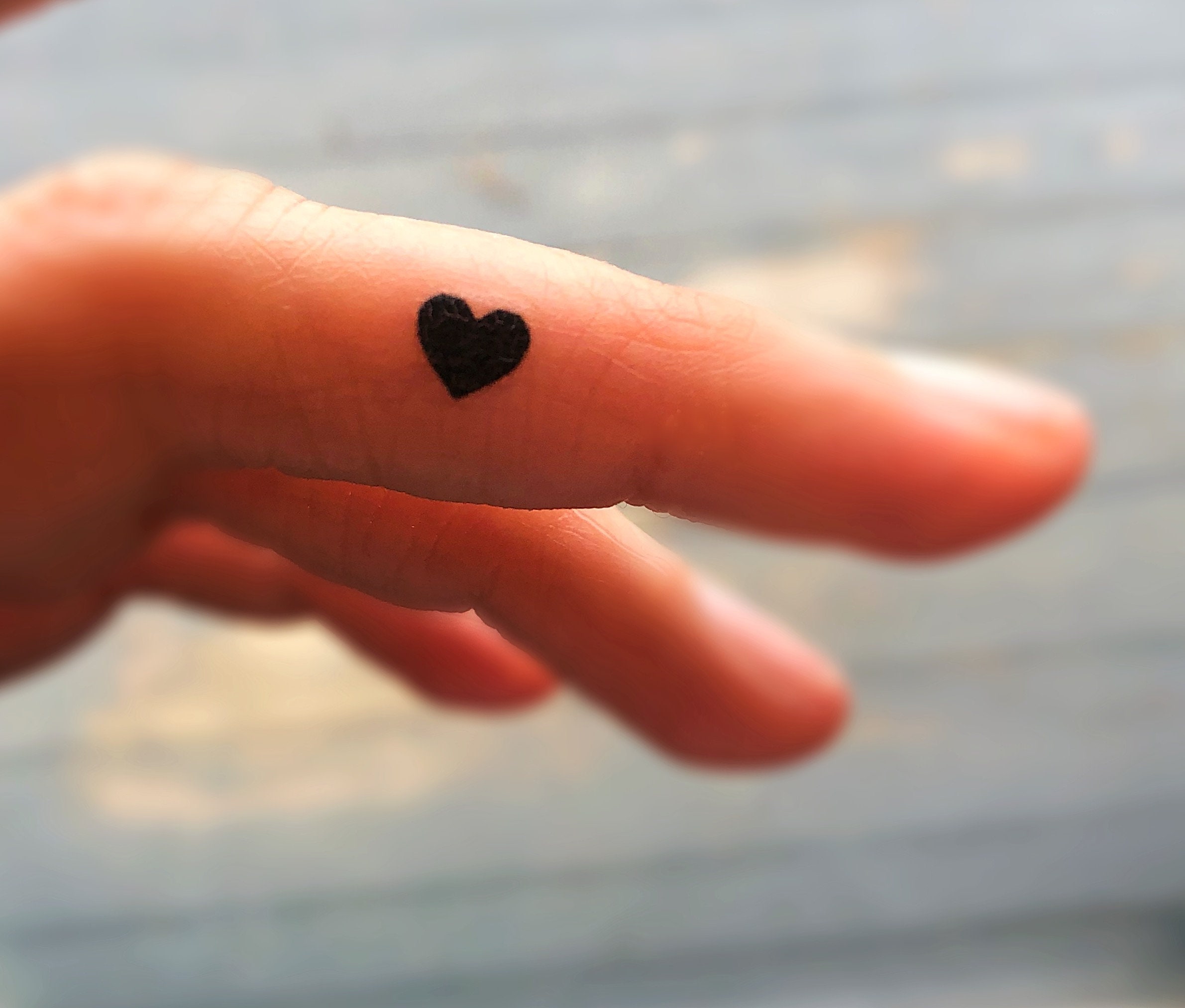 Simple solid black heart done by bocharovdima in Ukraine   wwwotziappcom  Black heart tattoos Black heart Tattoos