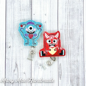 Love Monster choose Blue or Red Retractable Reel ID Badge Holder, made of Wipeable Vinyl