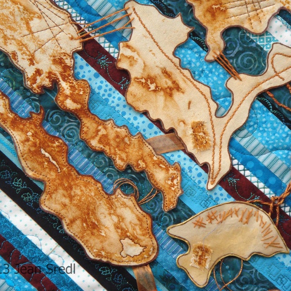 Textile Art quilt Wall Hanging "Pieces" close up of mixed media fiber art quilt in turquoise, rust dyed muslin and embellishments