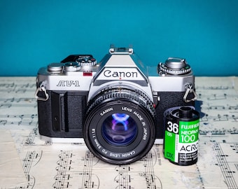 Working Vintage Canon AV-1 35mm Film SLR Camera with Lens