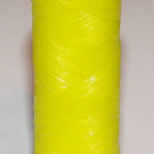 May include: A spool of bright yellow thread.