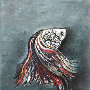 May include: A painting of a white and black fish with red and gold accents. The fish is swimming in a blue and green background.