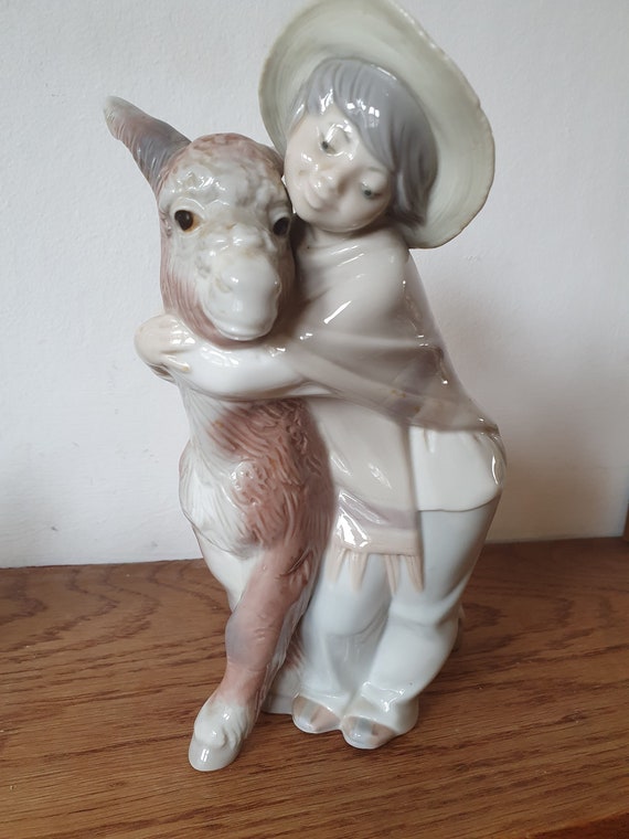 Lladro Figurine Retired, Lladro Figurine 1181 Platero and Marcelino, Boy  Hugging Donkey 7229, Collectible, Fine Art Porcelain Sculptures -   Canada