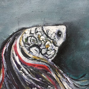 May include: Abstract painting of a fish with a white, gray, and black body and red and white fins. The fish is painted on a blue background.