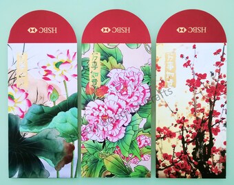 May include: Three red and white HSBC branded envelopes with floral designs. The envelopes feature illustrations of lotus flowers, peonies, and red plum blossoms. Each envelope has Chinese characters.
