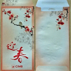 May include: Two red and white envelopes with a floral design. One envelope features a bird perched on a branch with red berries and Chinese characters. The other envelope has a self-adhesive strip.