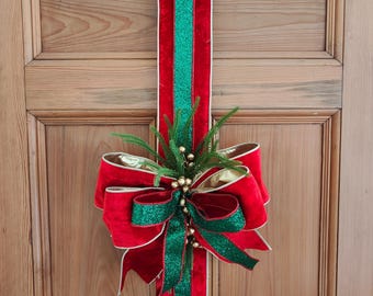 Door hanger traditional Christmas swag over the door large bow